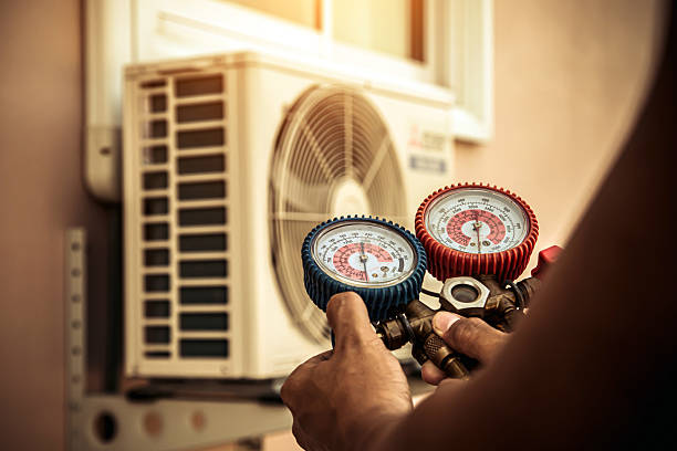 Professional Heat Pump Repair technician working in Marshfield, MA